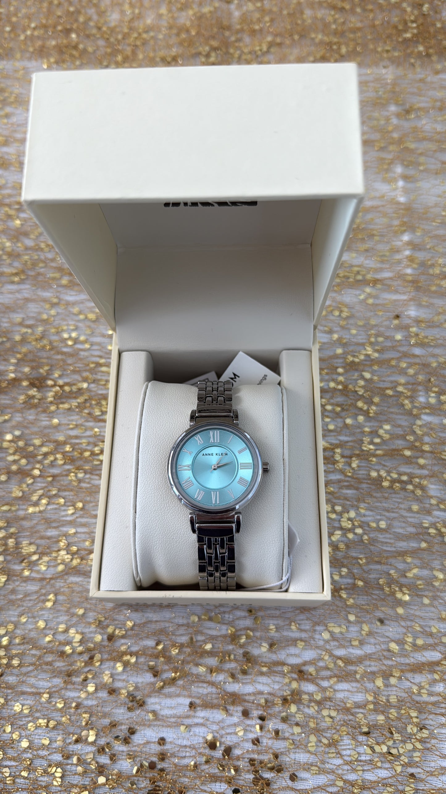 RELOJ NINE WEST MUJER SILVER FONDO CELESTE